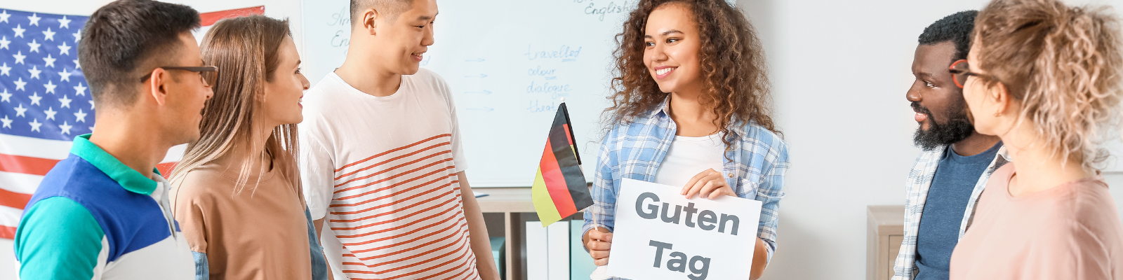 Menschen lernen Deutsch in einem Sprachkurs von Tür an Tür am Tag der Deutschen Sprache