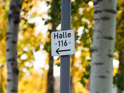 Schild zur Halle 116. Foto: Alexander Yarmak